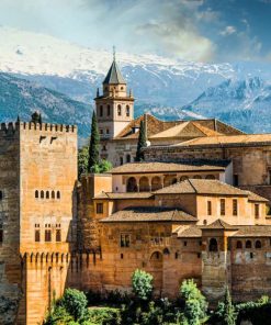 Visit Granada and see the Alhambra with snow-capped mountains behind