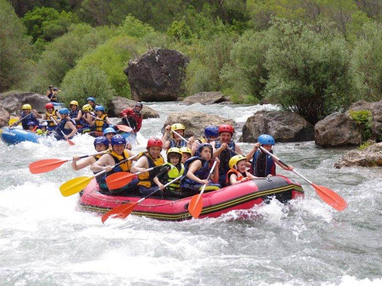 private transfer to Granada for rafting trip