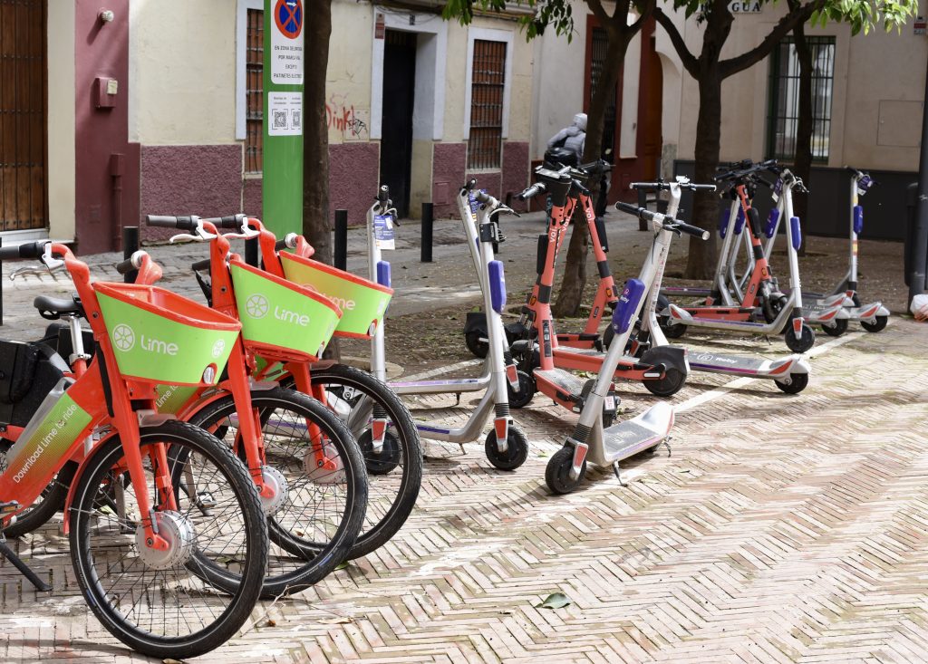 Voi scooters parked in a designated areas in Seville

