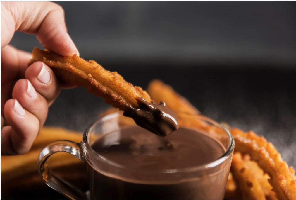 Churros with melted chocolate