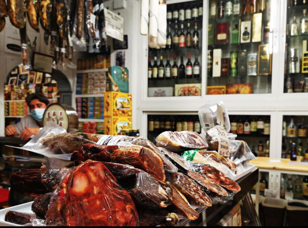Supermarket with jamon, canned goods and olive oil