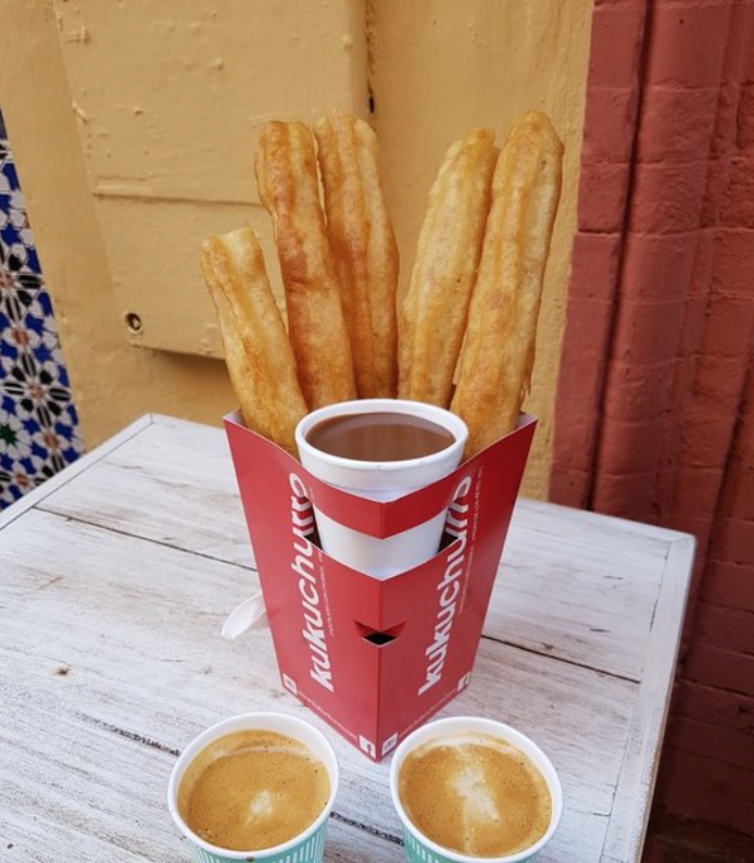 Freshly made churros, dipping chocolate and espresso 