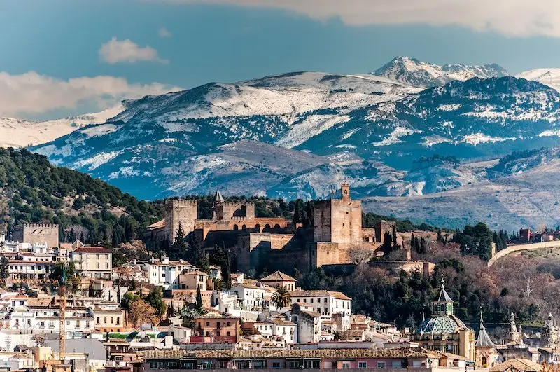 Why should you visit Granada in summer?